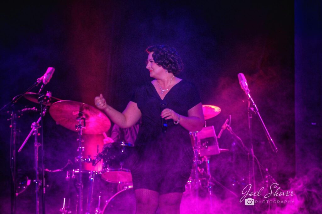 Good Vibes Live band on stage at an event