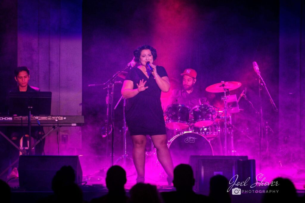 Deanna Maio singing live with her band